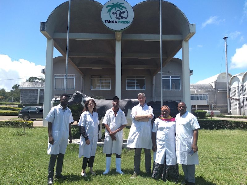 Dairy team pictured outside Tanga office building